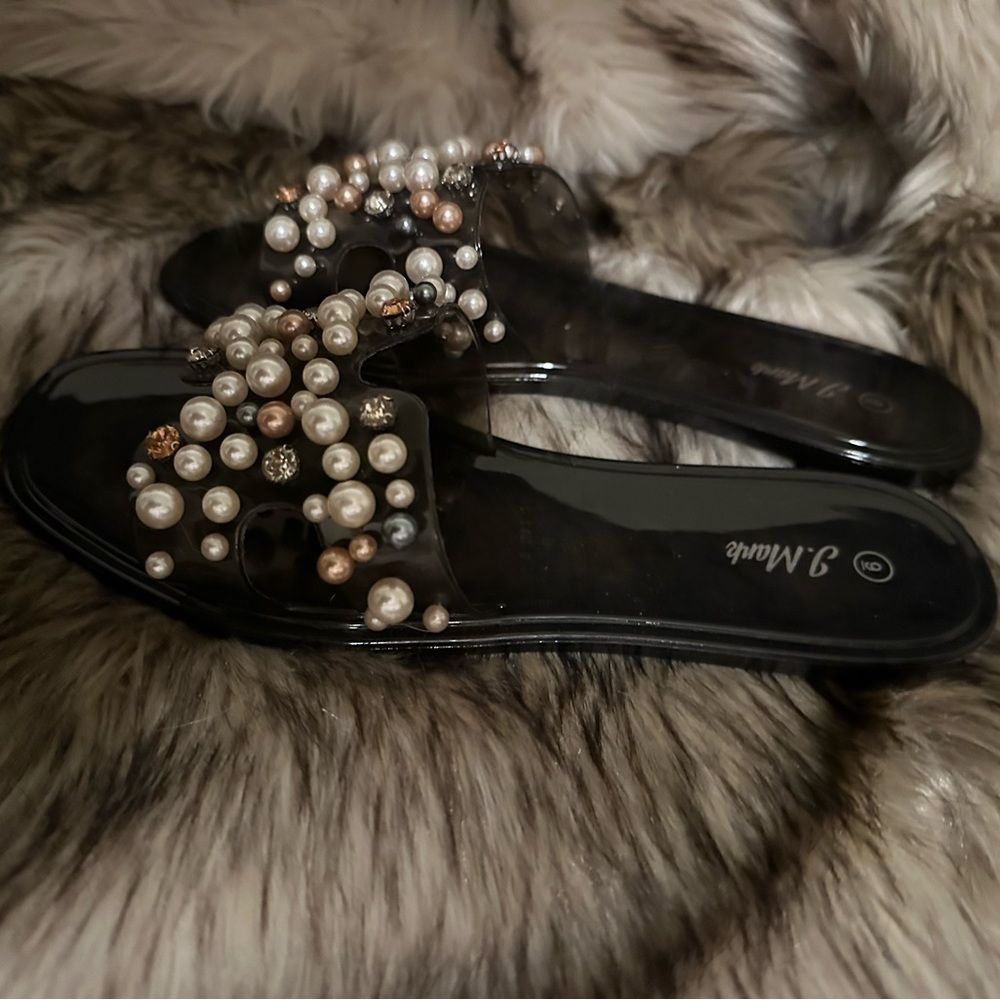 New super cute black jelly slip on sandals w/pearls etc.match cute w/top in post